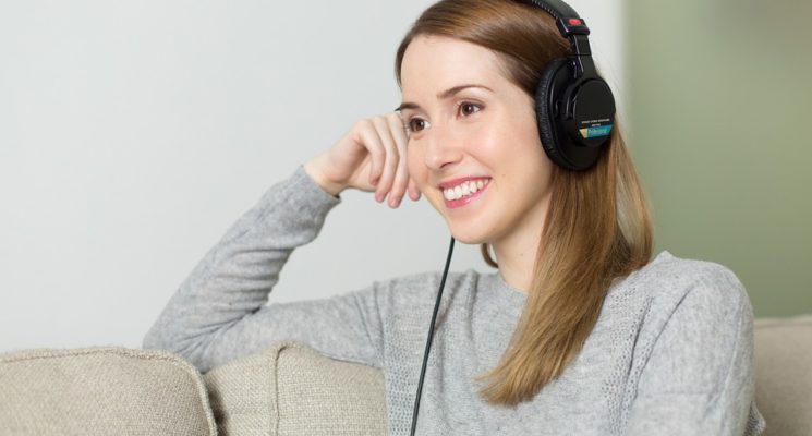 girl wearing black headphones